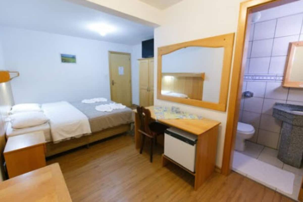 double or twin room, 1 double or 2 single beds | minibar, desk, blackout curtains, iron/ironing board