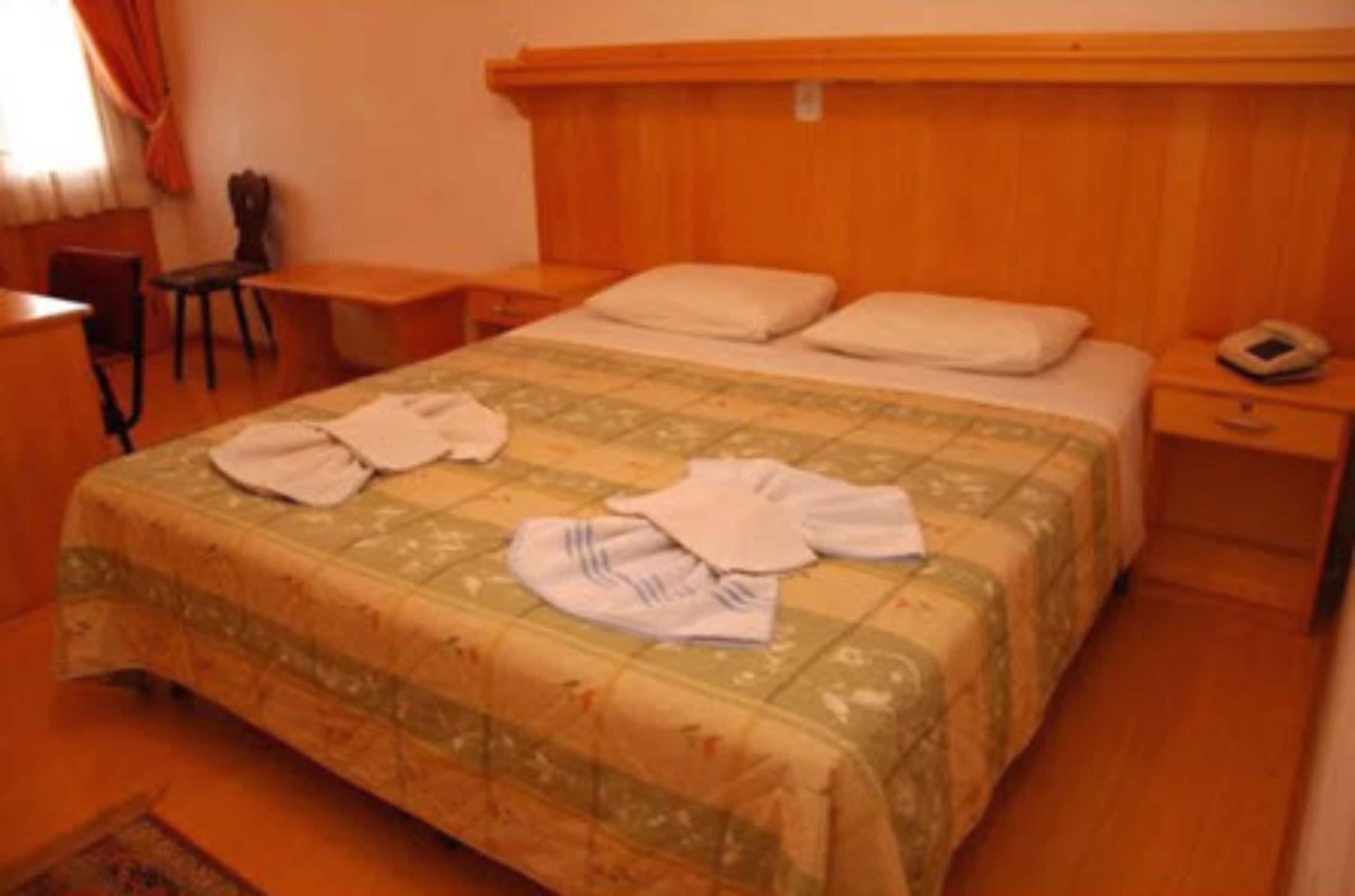 double or twin room, 1 double or 2 single beds | minibar, desk, blackout curtains, iron/ironing board