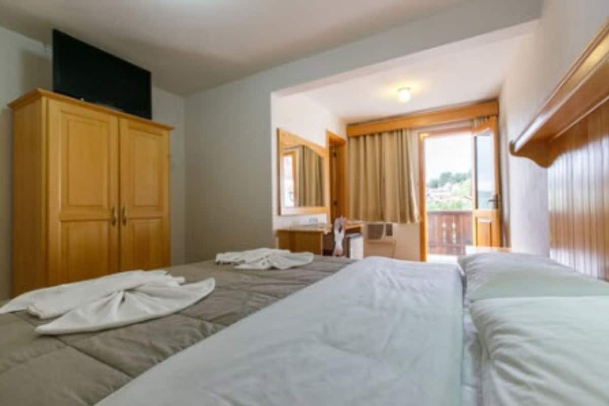 double or twin room, 1 double or 2 single beds | minibar, desk, blackout curtains, iron/ironing board