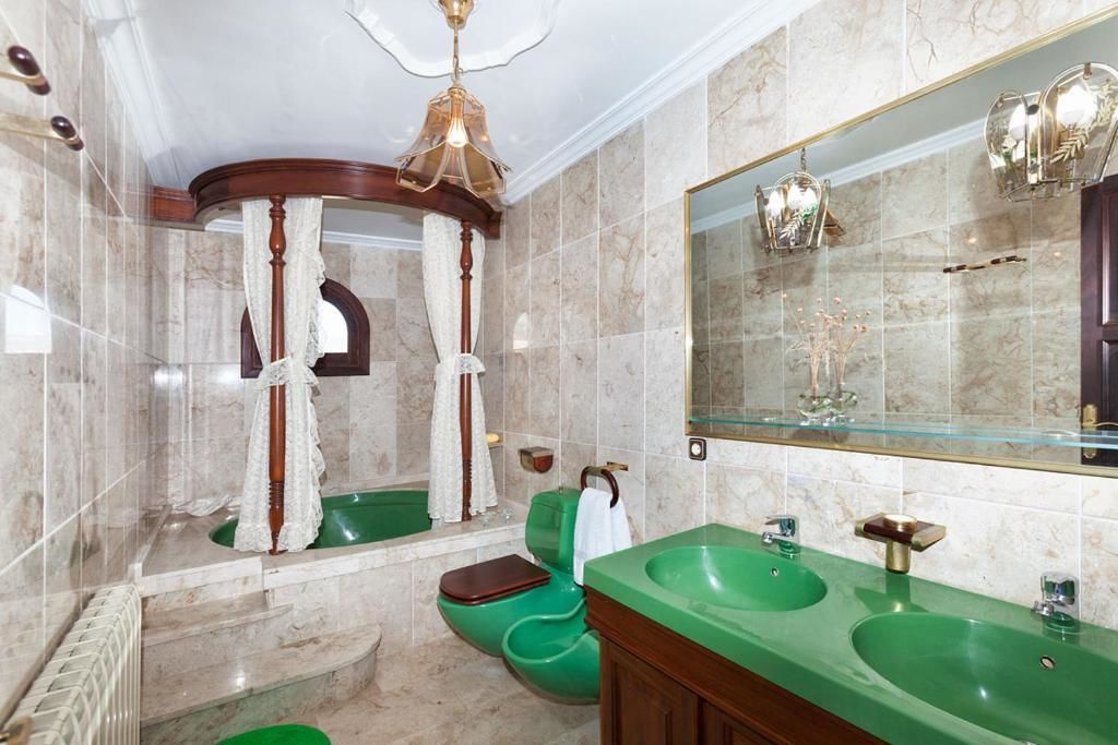 family room | 1 bedroom, minibar, in-room safe, individually decorated