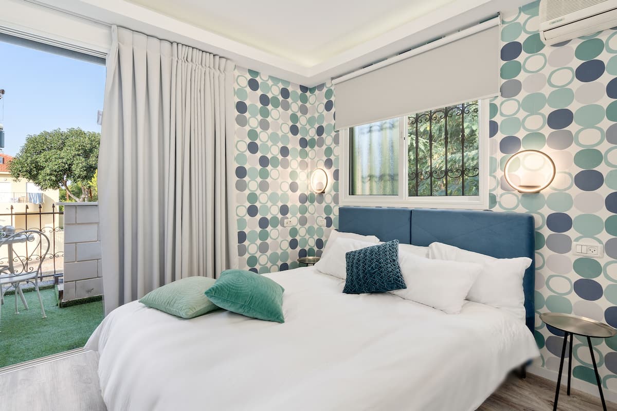 Apartemen Keluarga, 4 kamar tidur, pemandangan kota | Tirai kedap cahaya, setrika/meja setrika, Wi-Fi gratis, dan seprai linen