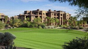 Stunning hotel grounds feature a lush lawn and beautifully landscaped surroundings.