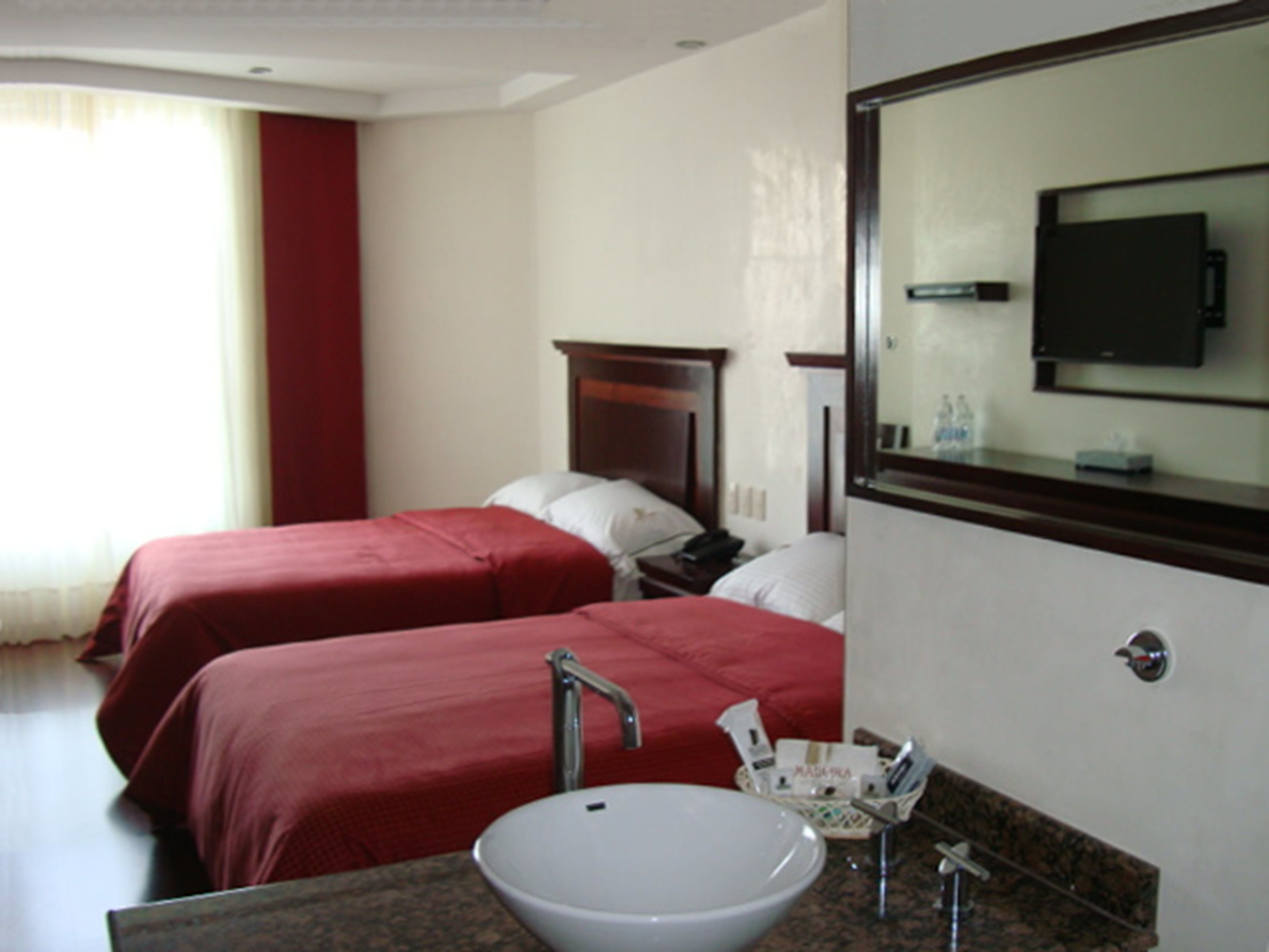 traditional room, 2 double beds | in-room safe, blackout curtains, iron/ironing board, free wifi