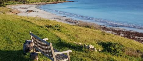 On the beach, sun-loungers, beach towels