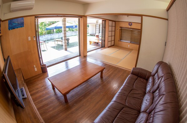 Japanese Western Style Room | Living area | Flat-screen TV - Minsyuku Meekiya (Nakijin)