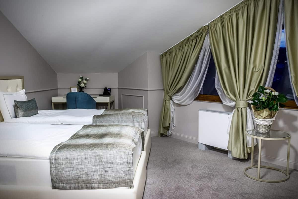 Superior Double Room | Minibar, in-room safe, desk, laptop workspace