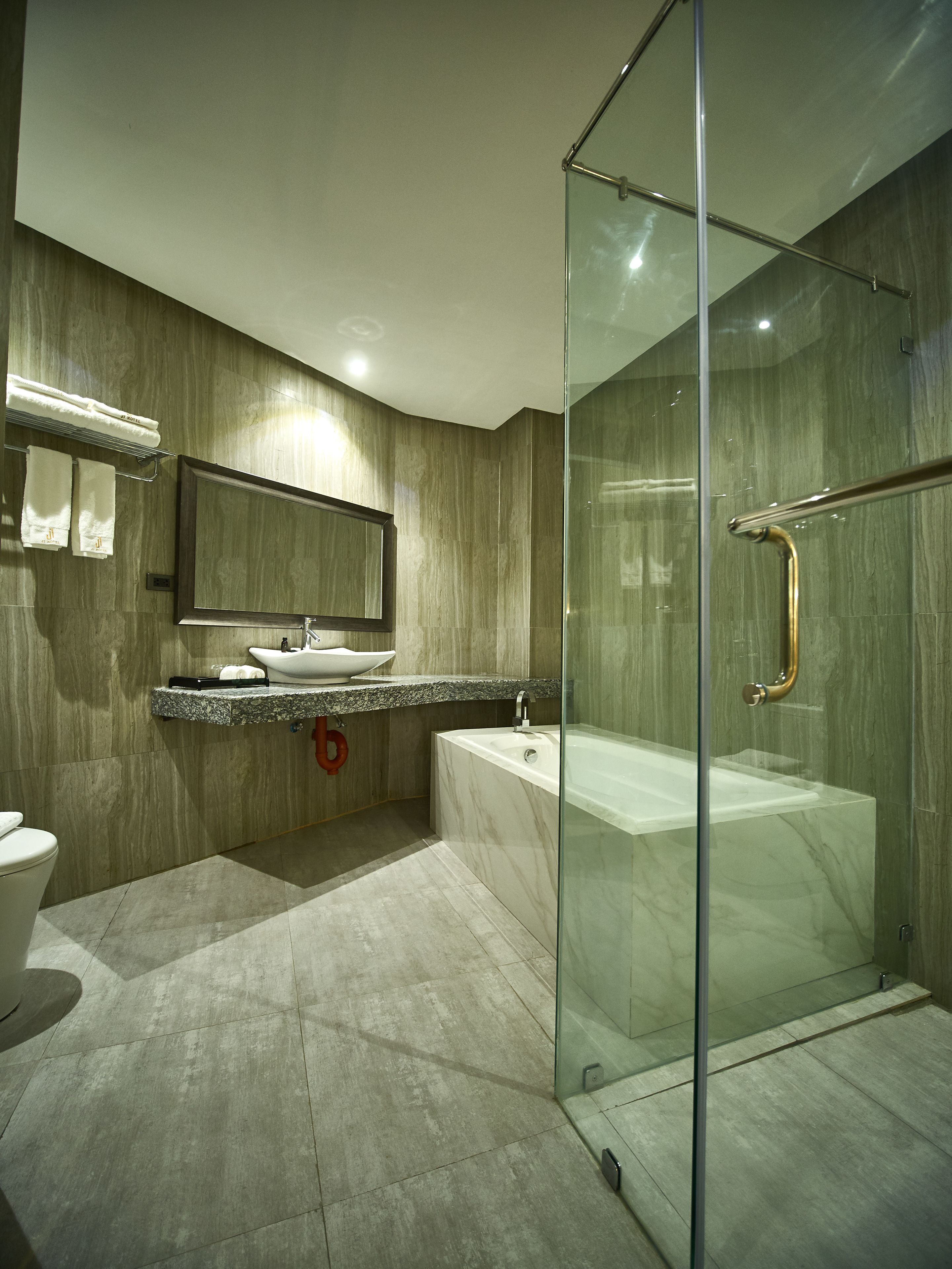 suite | bathroom | shower, slippers, towels
