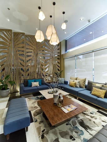 Lobby sitting area. J7 Plaza Hotel