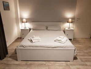 2 bedrooms, travel crib, WiFi, bed sheets