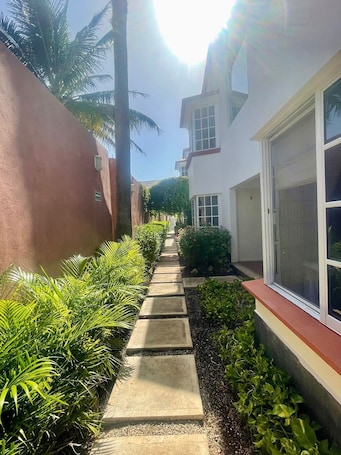 Property grounds. "Experience the Caribbean Lifestyle at Suites Lorens"