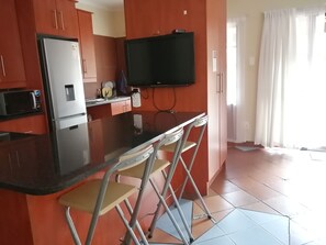 Appartamento Comfort | Cucina privata | Frigorifero, microonde, bollitore elettrico, pentole/stoviglie/utensili