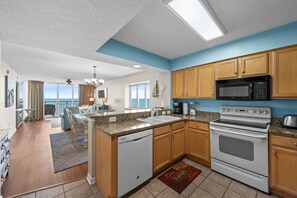 Fridge, microwave, oven, stovetop - Southshore Villas #1007, 4 BR Ocean Front Condo w large balcony, Indoor/Outdoor Pool, Lazy River, Kiddie Pool and Hot Tub (North Myrtle Beach)