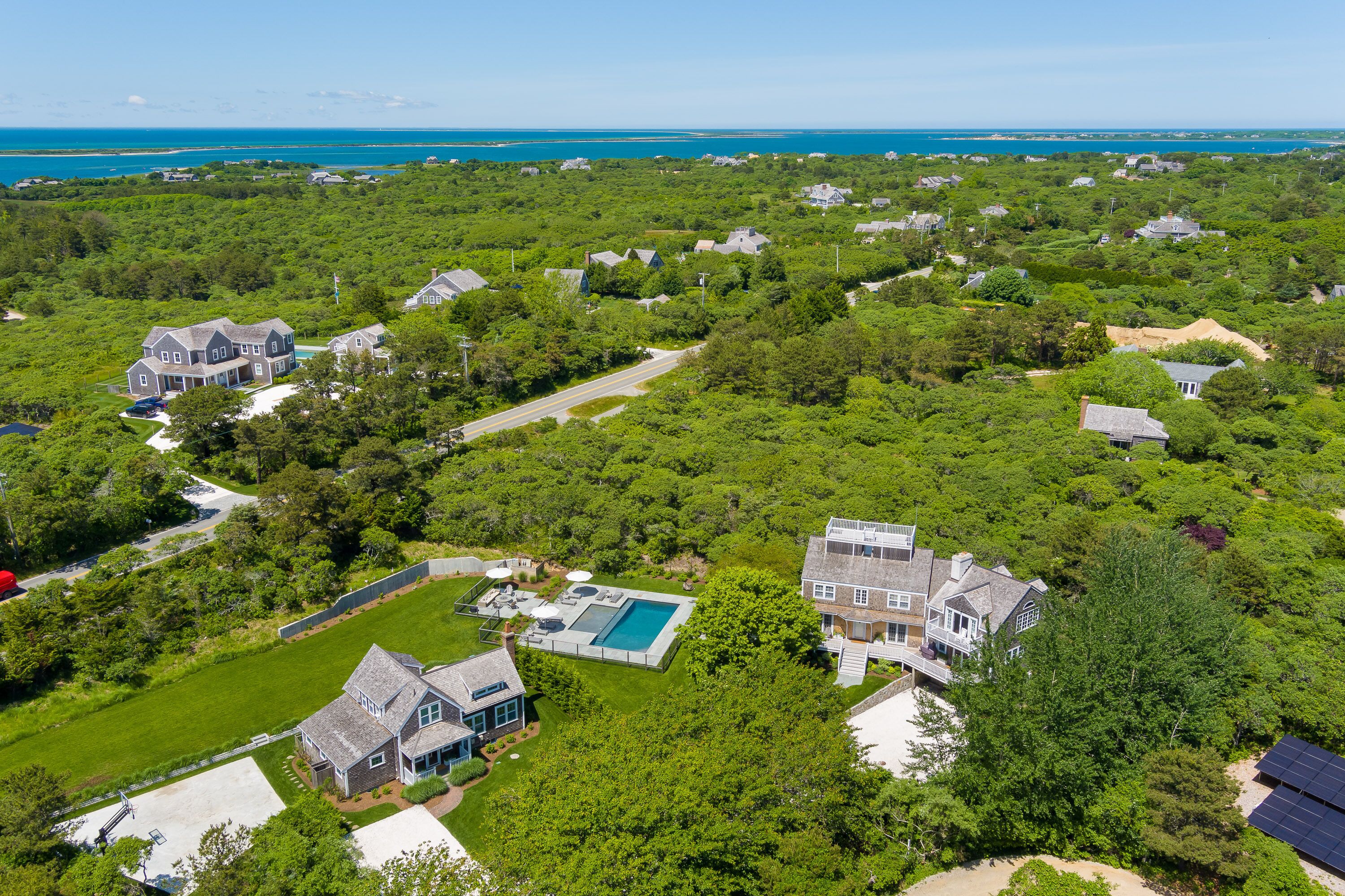 Nantucket family retreat with pool, basketball court, and bungalow