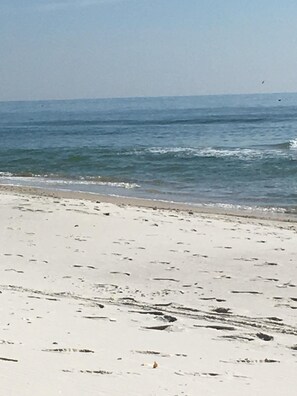 On the beach, sun-loungers