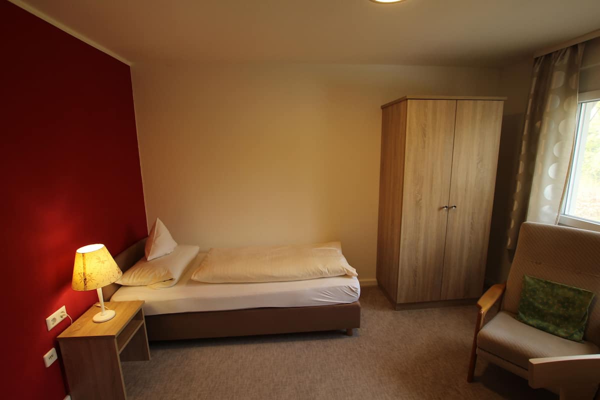 Desk, blackout curtains, free WiFi, bed sheets