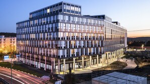 A modern multi-story building with a grid-like facade, large windows, and a flat roof. - Ecla Paris Massy Palaiseau (Palaiseau)