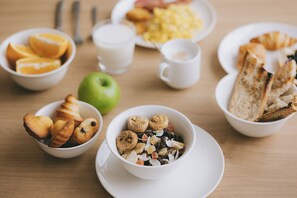 Daily buffet breakfast (EUR 14 per person)