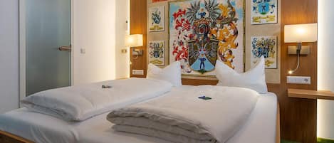 Minibar, escritorio, camas extra y wifi gratis