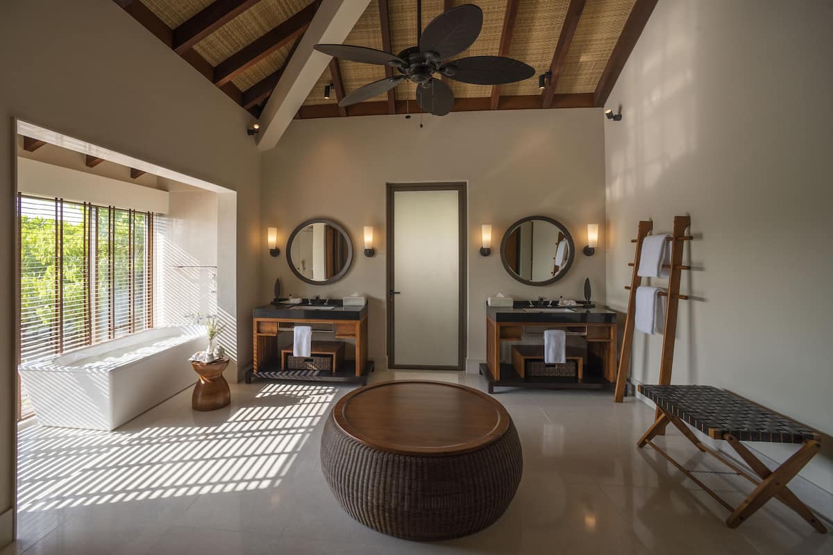 Separate bathtub and shower, free toiletries, hair dryer, bathrobes