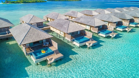 Villa, 1 Bedroom (Sunset Water Pool Villa) | Minibar, in-room safe, individually decorated, individually furnished