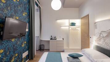 Premium bedding, down duvets, minibar, in-room safe