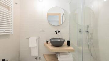 Shower, free toiletries, hair dryer, slippers