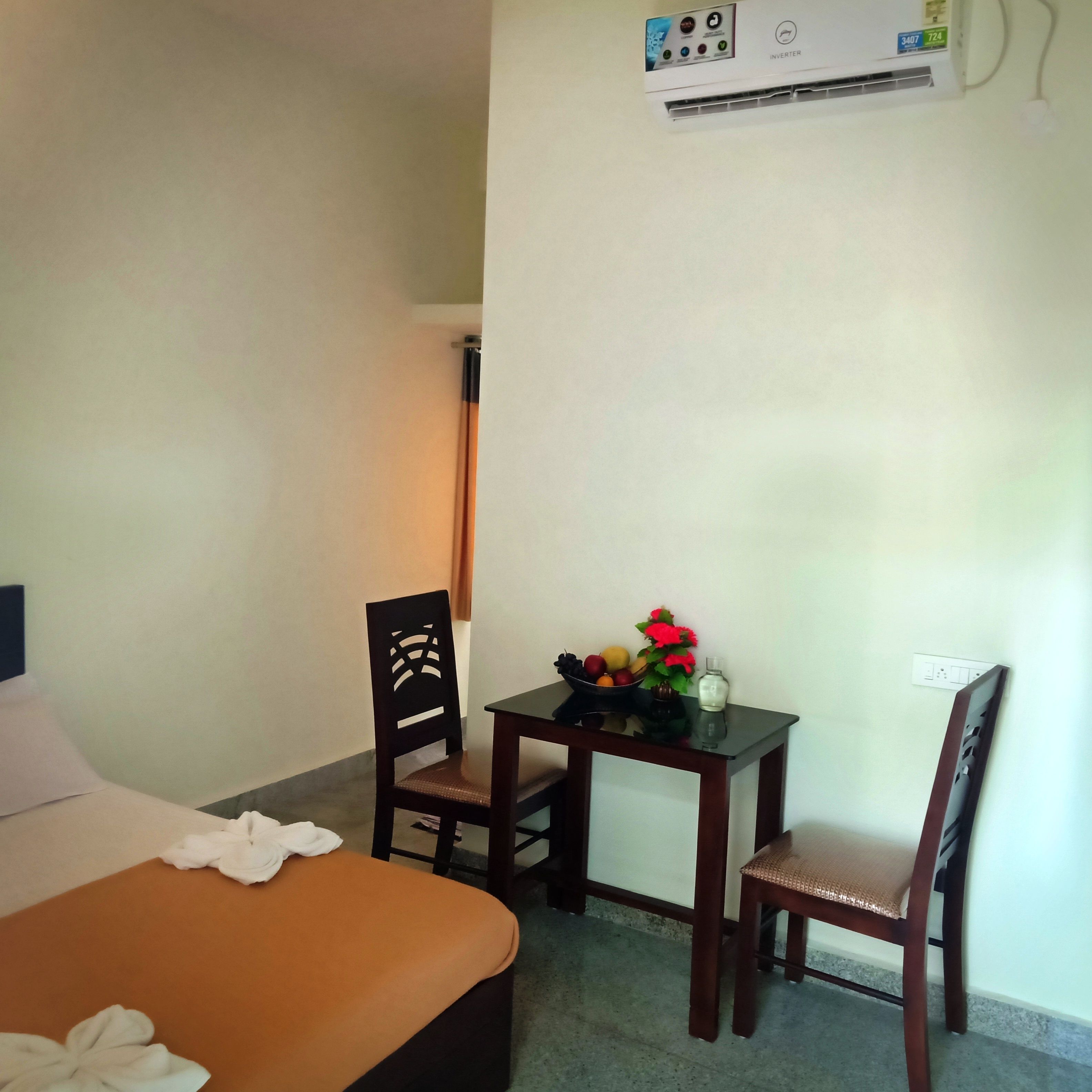 basic double room, 1 double bed, garden view | in-room safe, desk, rollaway beds, bed sheets