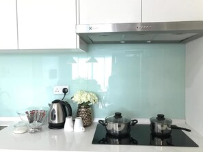 Classic Apartment, 3 Bedrooms | Private kitchen | Full-size fridge, microwave, stovetop, electric kettle