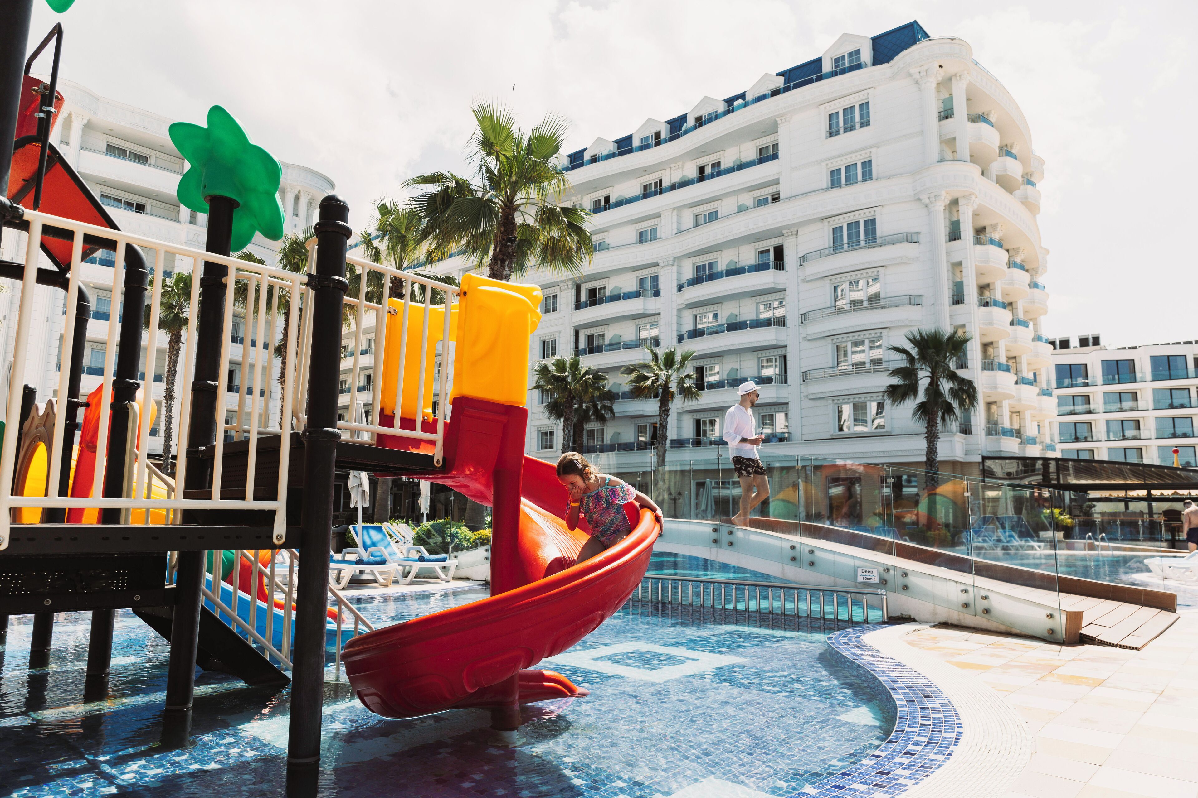 2 indoor pools, 2 outdoor pools, open 9:00 AM to 6:00 PM, pool umbrellas