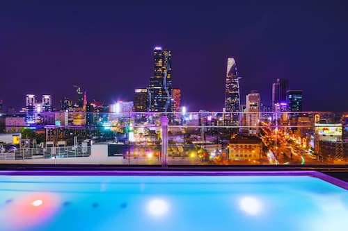 Outdoor pool, open 6:00 AM to 10:00 PM, pool umbrellas, pool loungers