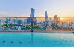 Outdoor pool, open 6:00 AM to 10:00 PM, pool umbrellas, sun loungers