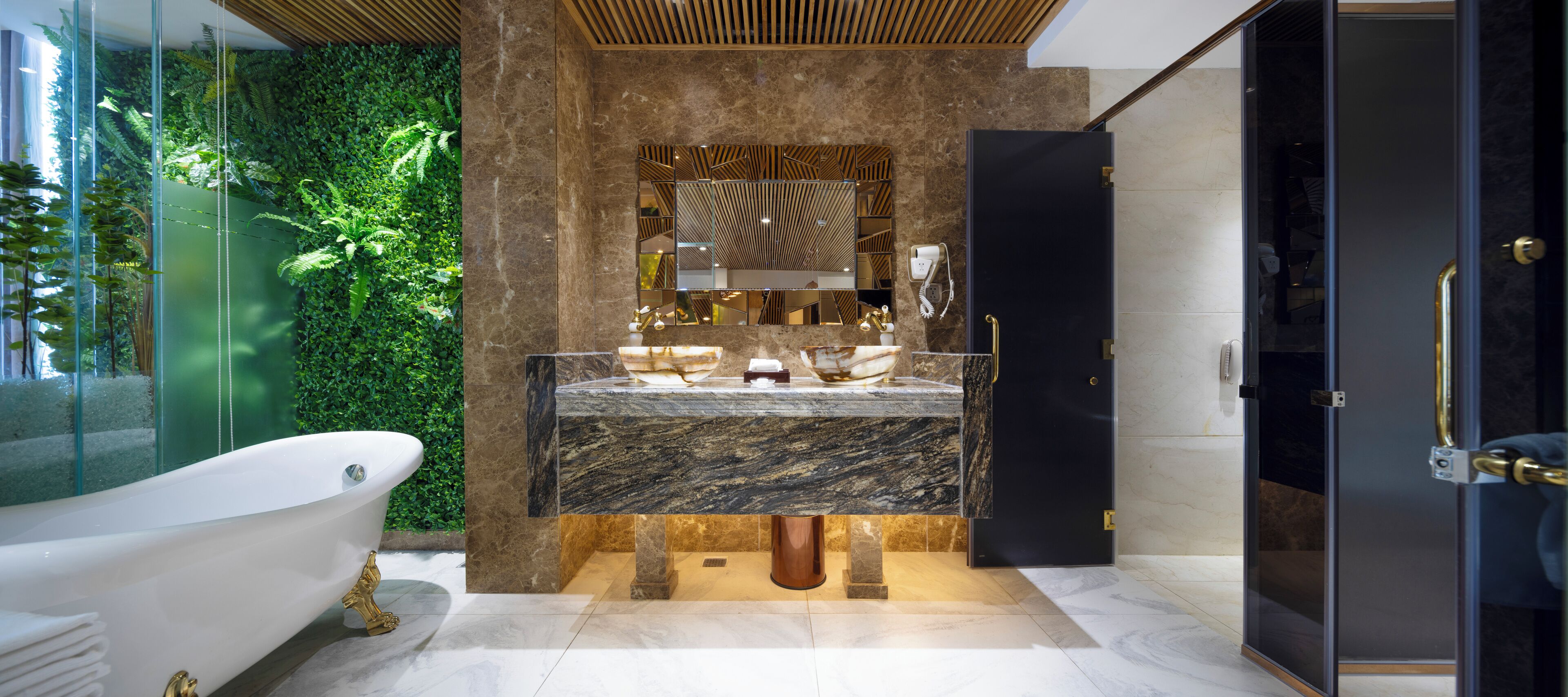 signature suite two-bedroom city view - free minibar & afternoon tea | bathroom | hydromassage showerhead, designer toiletries, hair dryer, bathrobes