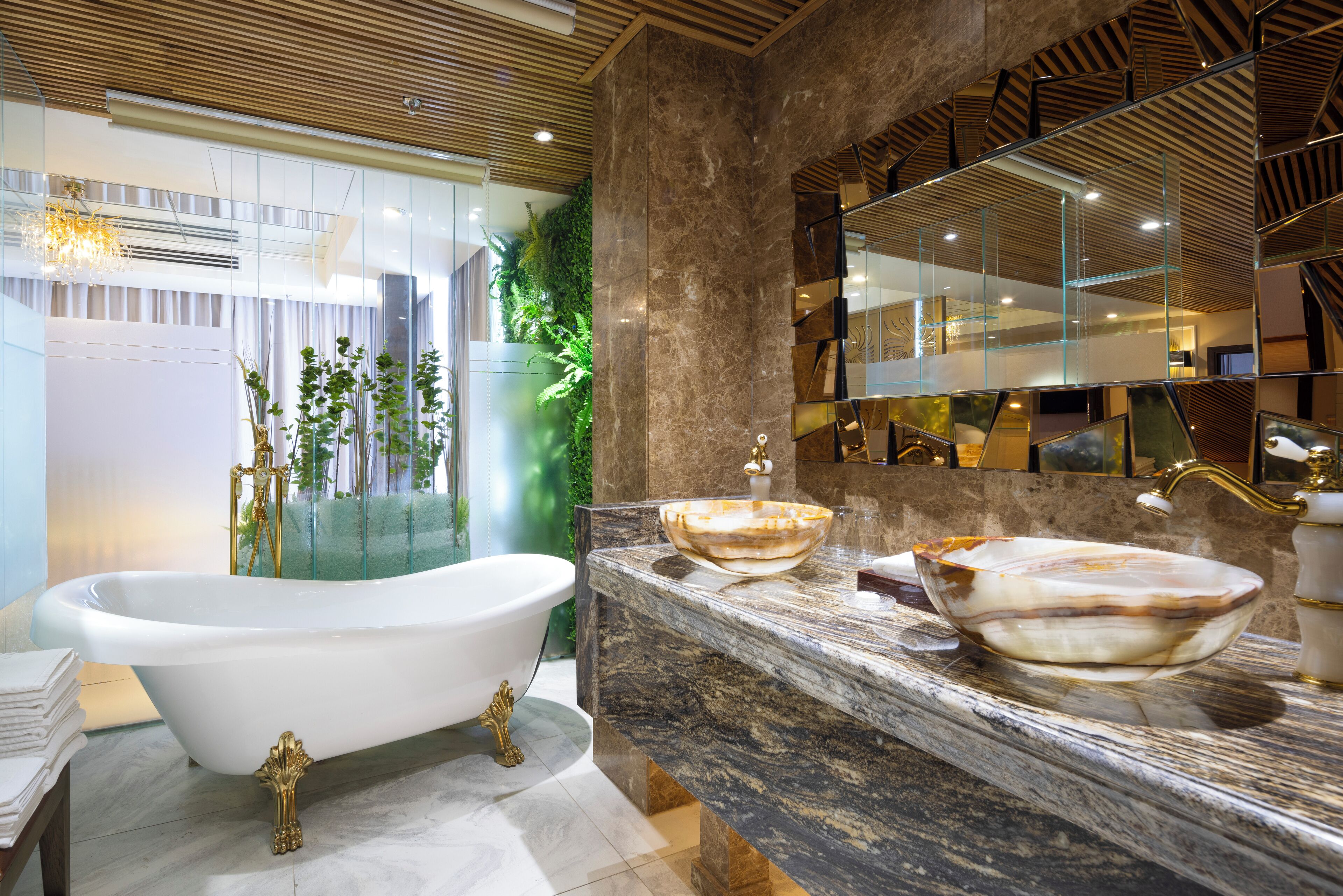 signature suite two-bedroom city view - free minibar & afternoon tea | bathroom | hydromassage showerhead, designer toiletries, hair dryer, bathrobes