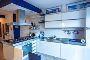 Apartment, 2 Bedrooms | Private kitchen | Cookware/dishes/utensils - Promenade (Jesolo)