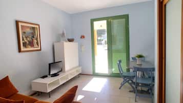 Vila, 2 quartos | Área de estar | TV de tela plana