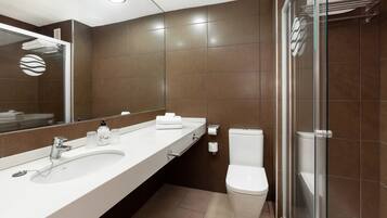 Shower, spring water bathtub, free toiletries, hair dryer