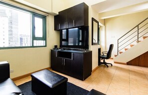 Modern BGC Manila Loft (26M2) | Living area | Flat-screen TV
