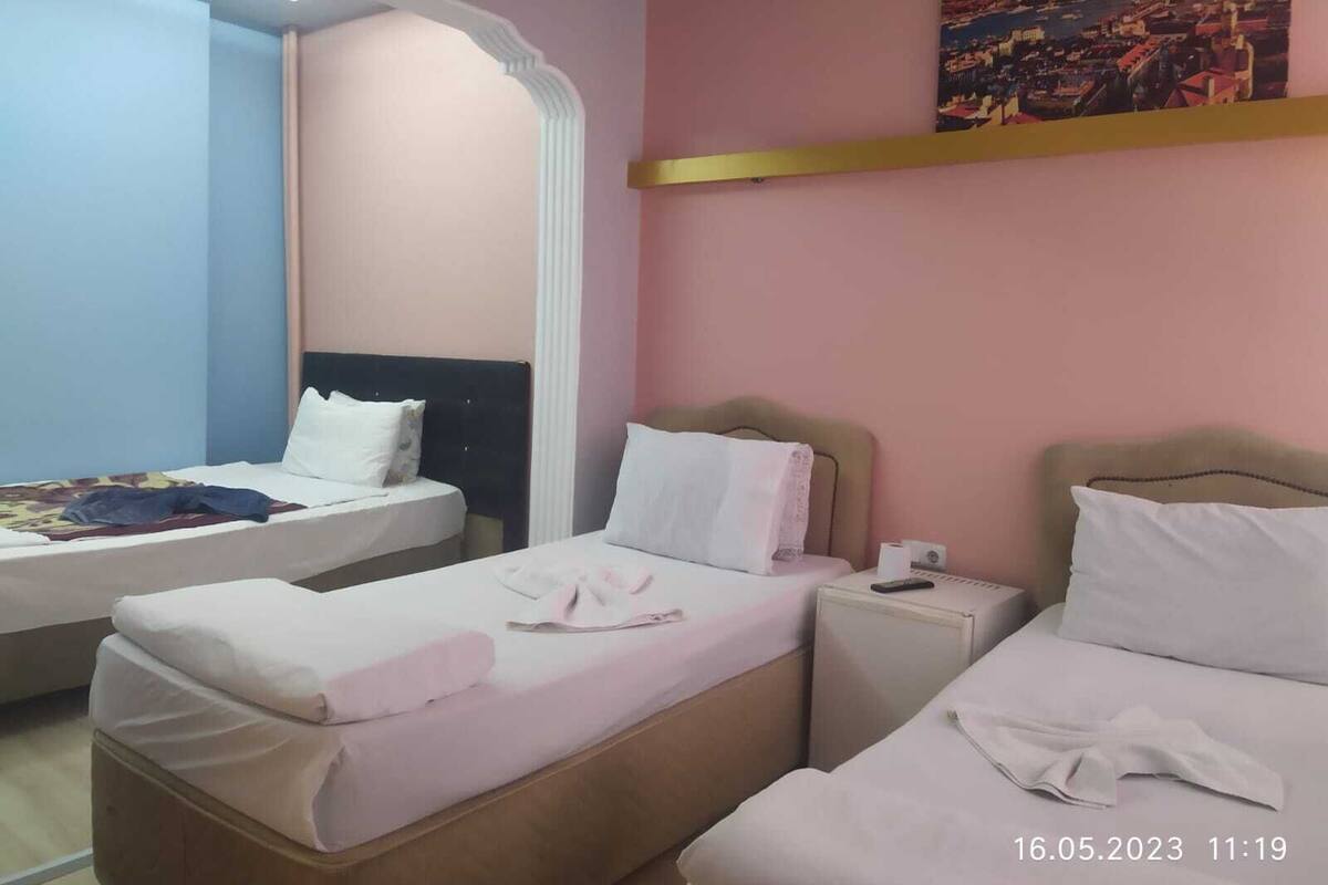 Standard Triple Room | Desk, laptop workspace, WiFi (free), bed sheets