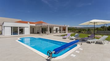 Outdoor pool, pool umbrellas, pool loungers