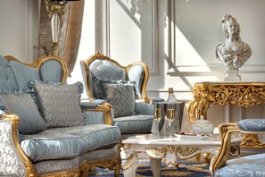 Suite Alexandra | Living area | 90-cm flat-screen TV with satellite channels