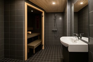 City Apartment, Sauna, Courtyard View | Bathroom | Shower, free toiletries, hair dryer, bidet