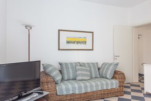 Apartamento, 2 quartos, varanda | Área de estar