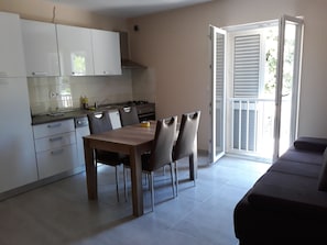 Big Apartment, 1 Bedroom, Patio | Living area | 80-cm flat-screen TV with satellite channels, LED TV - Apartments Juliet (Orebic)