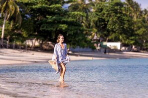On the beach, beach towels