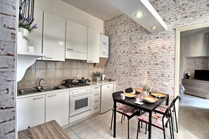 Studio, 1 Bedroom | Private kitchen | Full-size fridge, stovetop, cookware/dishes/utensils - Antica Corte Bonanomi (Como)