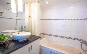 Hair dryer, towels, soap, shampoo