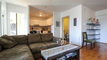 Apartment, 2 Bedrooms (113418) | Living area | Flat-screen TV