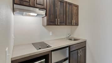 Suite, 1 King Bed, Non Smoking, Kitchenette (with Sofabed) | Hypo-allergenic bedding, pillowtop beds, desk, iron/ironing board