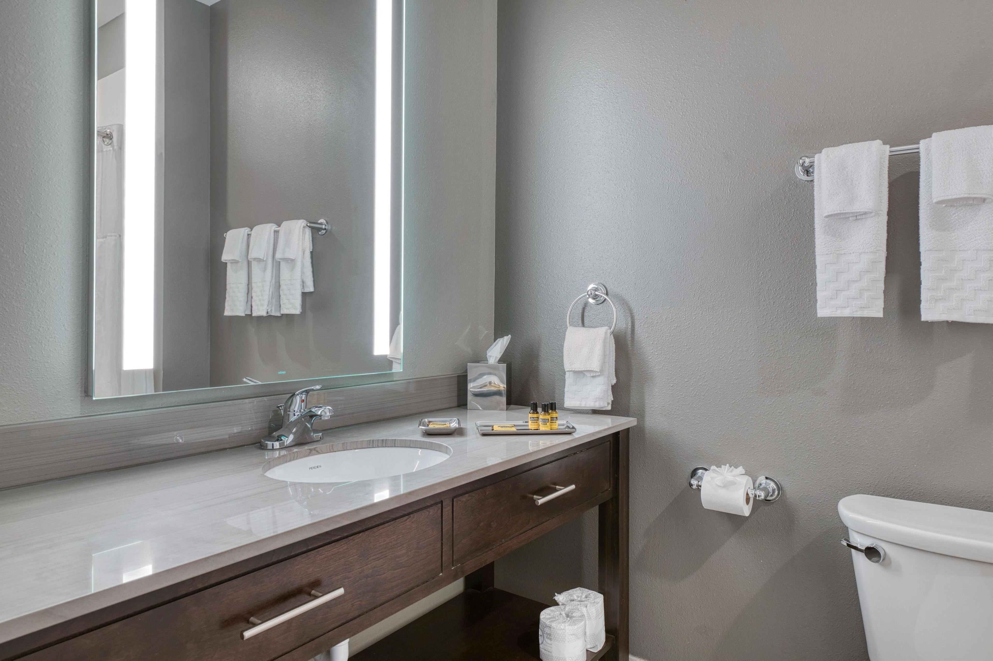 standard room, 2 queen beds, non smoking, refrigerator & microwave | bathroom | combined shower/bathtub, hair dryer, towels