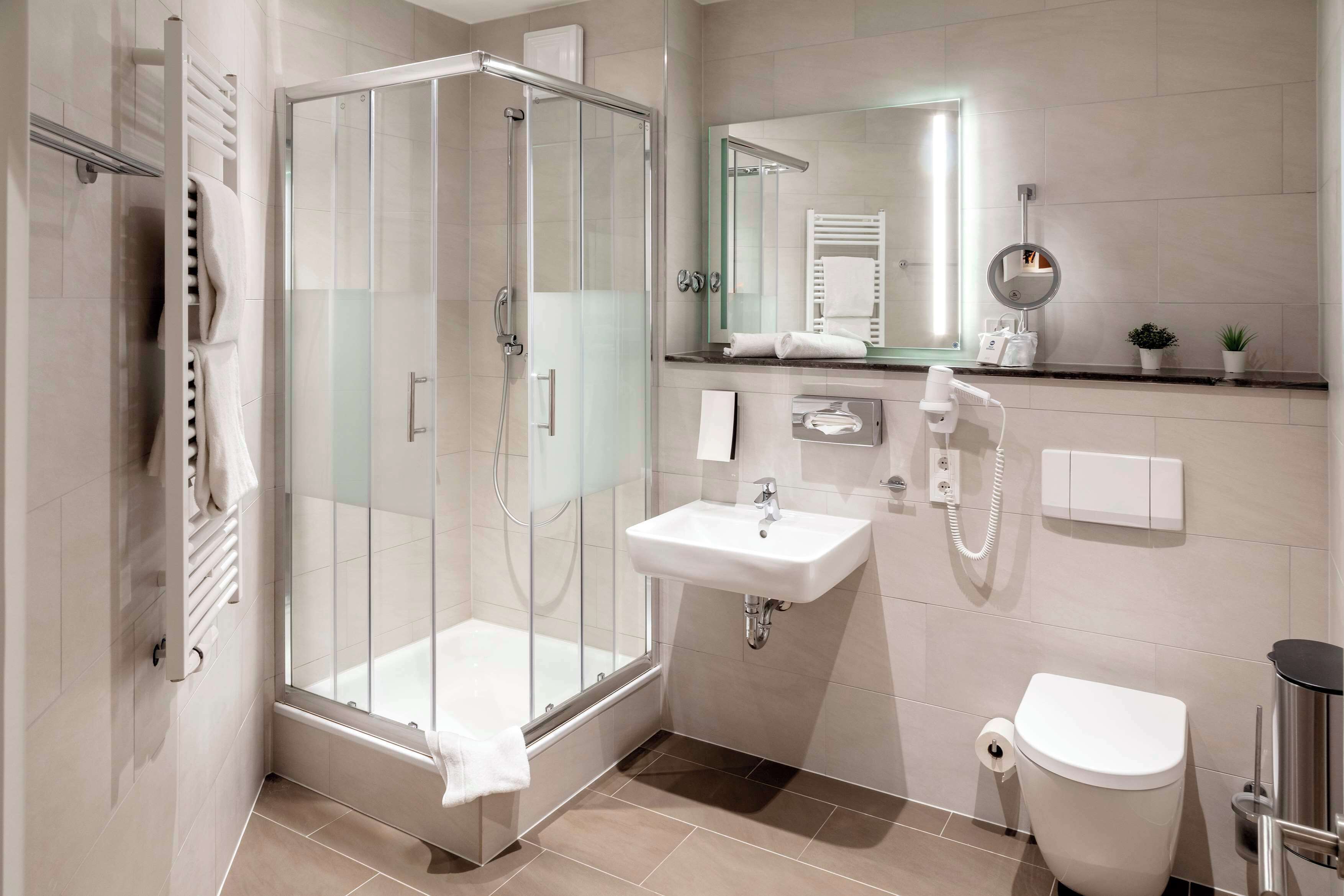 standard room, 1 double bed, kitchenette (converts to 2 twin beds;with sofabed) | bathroom | hair dryer, towels, soap, shampoo